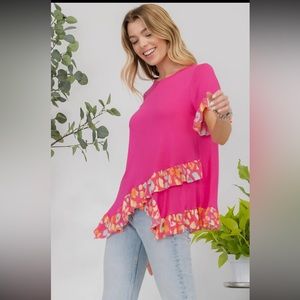 Plus sizes fuschia ruffle top in short sleeves with fun ruffles